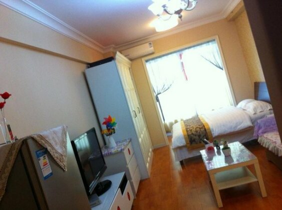 Dalian Yinghao Zuoan Classic Apartment - Photo3