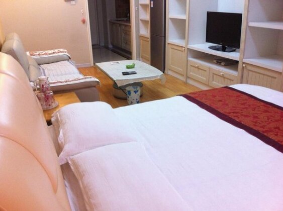 Dalian Yinghao Zuoan Classic Apartment - Photo4