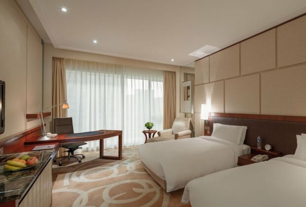 New World Dalian Hotel - Photo4