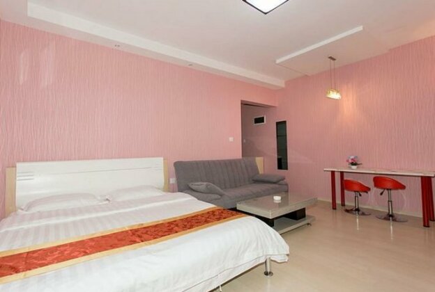 Xinghai Haiyue Bay Suites Apartment Dalian - Photo4