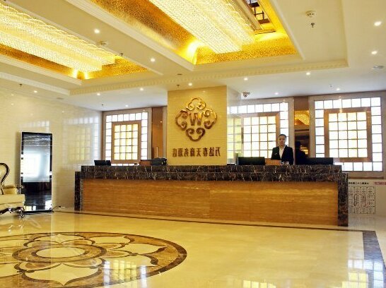 Wanda Chuntian Business Hotel - Photo4