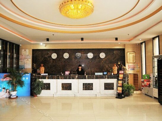 Xin Huanghe Business Hotel - Photo4