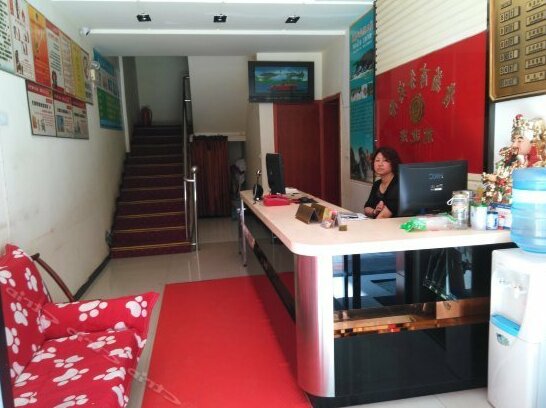 Enshi Qingju Business Inn - Photo4