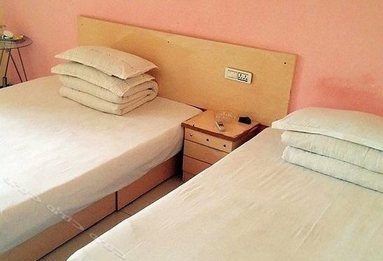 Ximuwu Motel Chain Inn Enshi Hangkong Road - Photo5