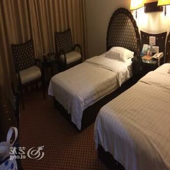 Huaqiang Hotel - Photo4