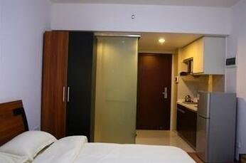 Yasi Jiuding International Hotel Apartment - Photo5