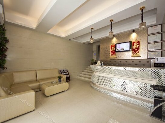 Huayi Jingpin Hotel - Photo2