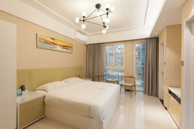 Gan Run Shuangcheng Int Hotel Apartment - Photo4