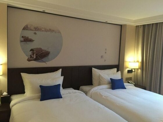 Xuelong Hotel - Photo4