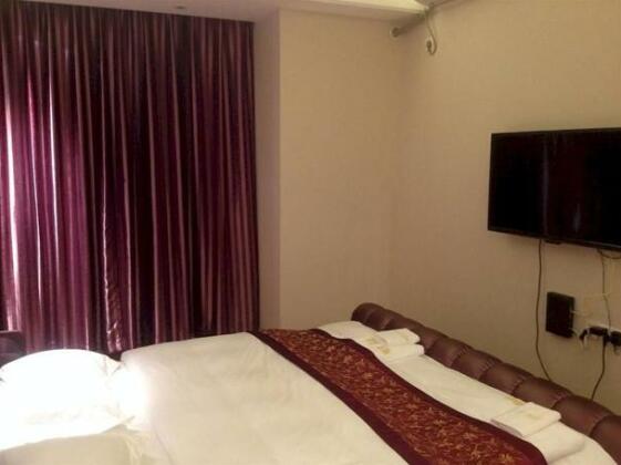 Yichao Apartment Hotel - Photo4