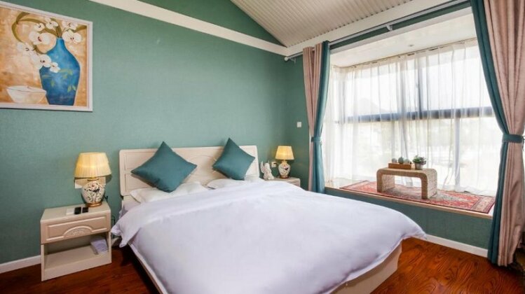 Floral Hotel Xishe Vila - Photo2