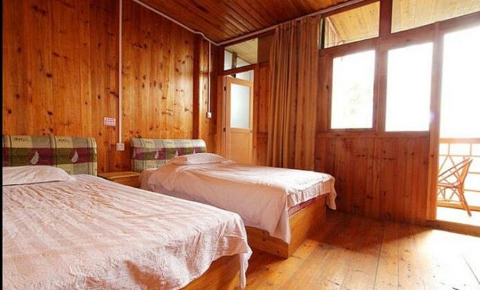 Longshenglongji Qixinglou Hostel - Photo5