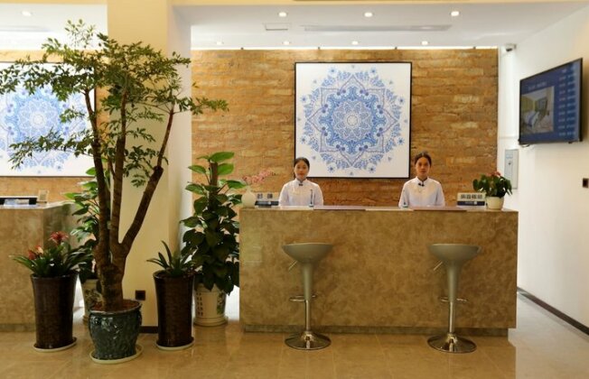 Mu Tong Holiday Hotel - Photo4