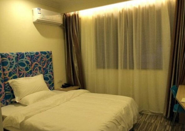 Purple Flower Hotel - Photo3
