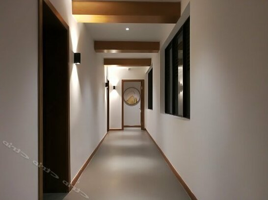Qixi Meidi Holiday Hotel - Photo2
