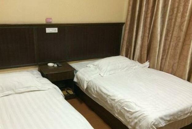 Xing'an Yinzuo Business Hotel - Photo5