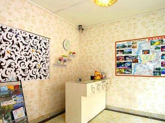 Xuanyi Holiday Hotel - Photo4