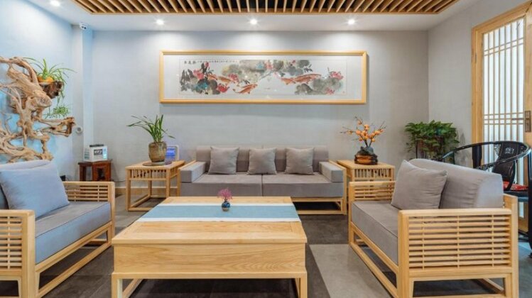 Floral Hotel Yinchenju Guesthouse - Photo2