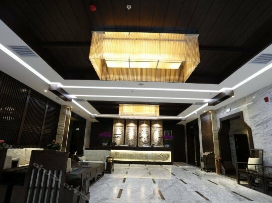 Tasha Shangpin Hotel - Photo4