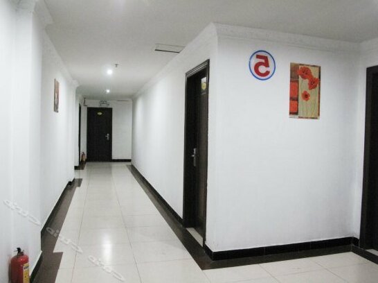 Fuyuan Business Hotel - Photo2