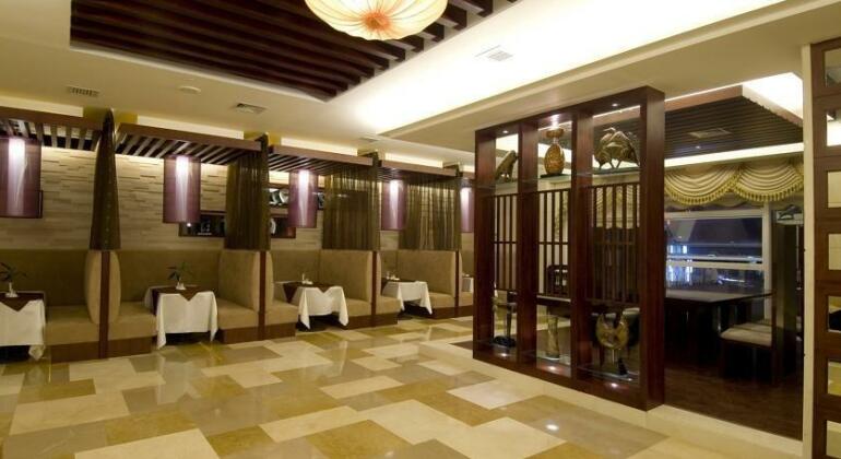 Hainan Wanlilong Business Hotel - Photo4