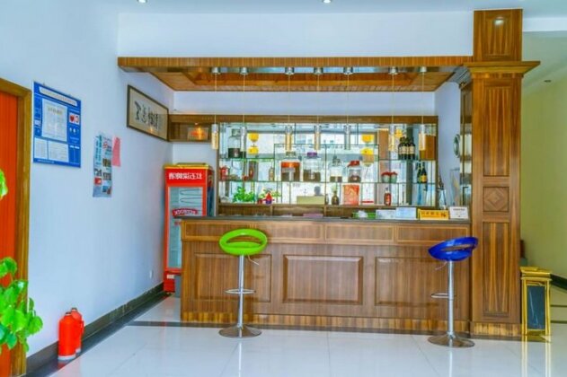 Yijie Holiday Hotel - Photo4