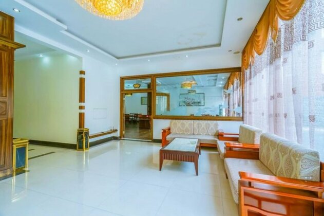 Yijie Holiday Hotel - Photo5