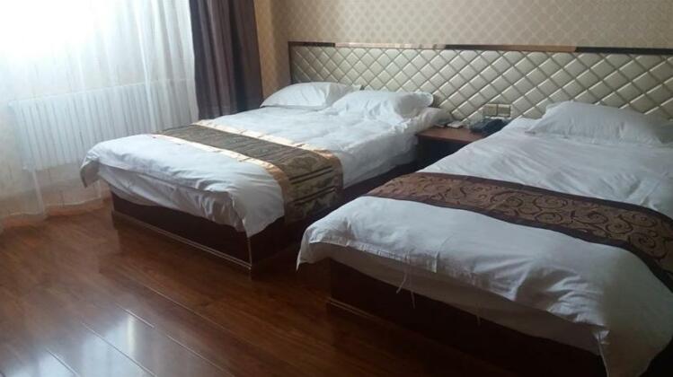 Harbin Haochen Hotel - Photo2