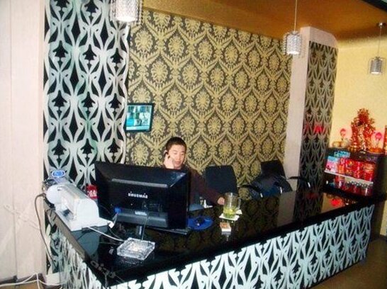 Huayi Express Hotel Harbin - Photo2