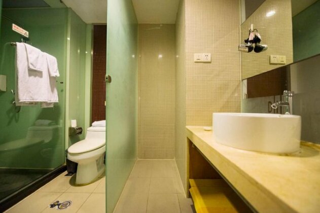 Motel Harbin Xinyang Kaide Plaza - Photo4