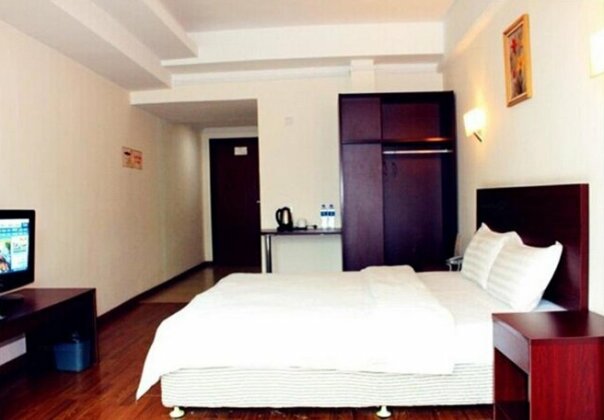 Yijia Holiday Hotel - Photo2