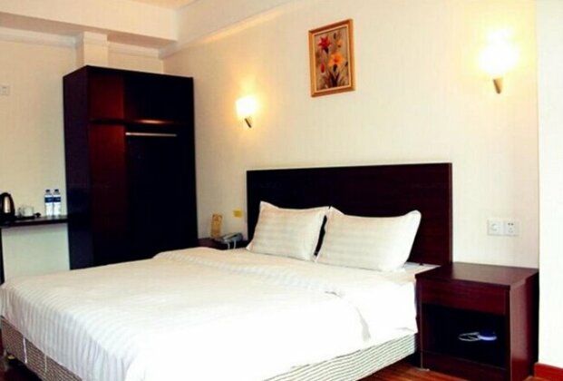 Yijia Holiday Hotel - Photo4