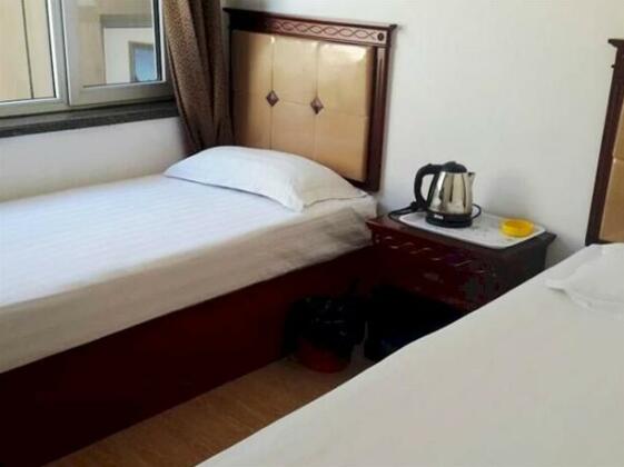 Xingcheng Xiaolonggong Hotel - Photo4