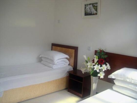 Xingcheng Xinxin Family Inn - Photo3