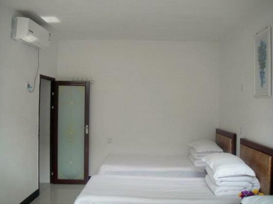 Xingcheng Xinxin Family Inn - Photo5