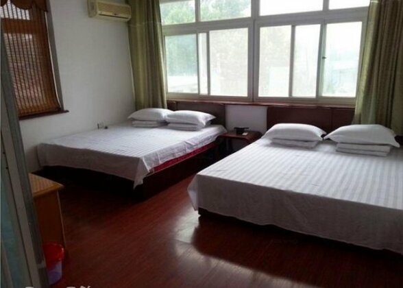 Xingcheng Xinyue Apartment Hotel - Photo4
