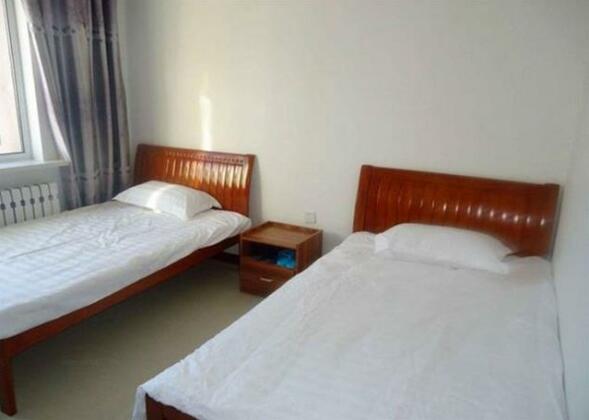 Lvcaodi Family Hostel - Photo5