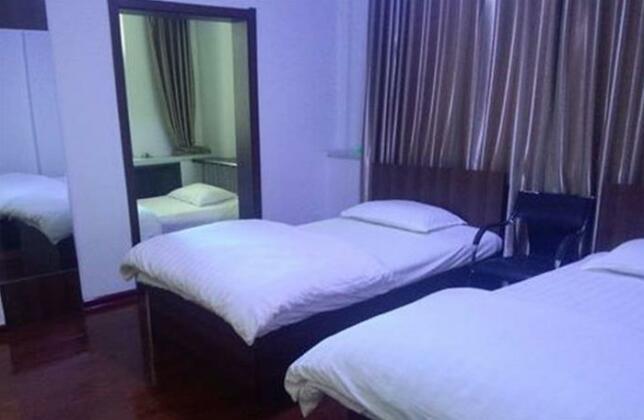Sanjiaodi Hotel - Photo2