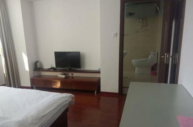 Sanjiaodi Hotel - Photo3