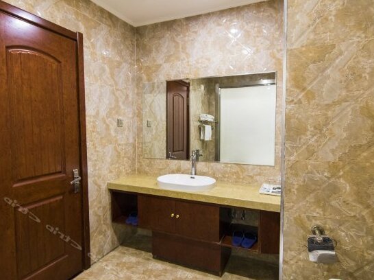 Xinmingyuan Business Hotel - Photo4