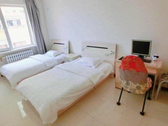 Zaoyuan Gucheng Family Hotel - Photo3