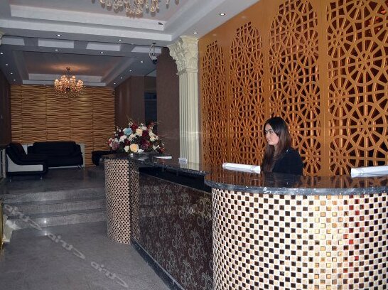 Yining Huarui Business Hotel - Photo5