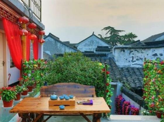 Shuimo Yinxiang Xitang Weimei Holiday Garden Hostel - Photo4