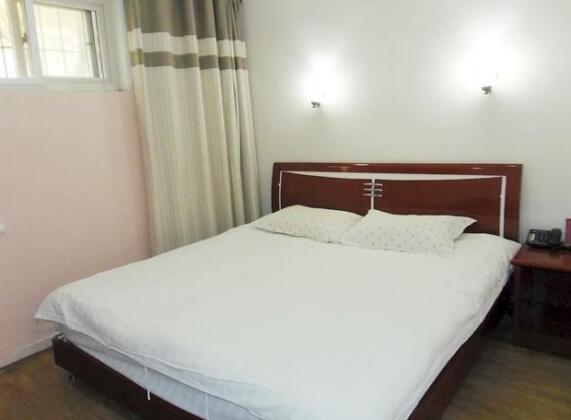 Ronghe Xinya Business Hotel - Photo4