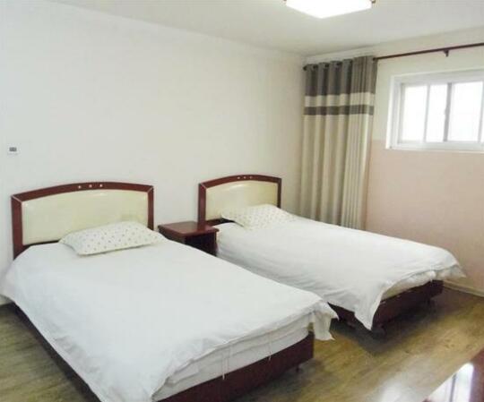 Ronghe Xinya Business Hotel - Photo5