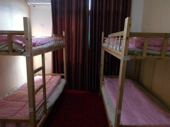 Zhangge Youth Hostel - Photo5