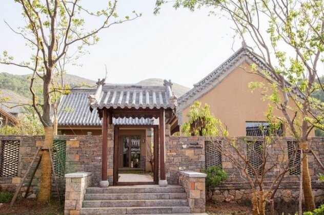 Qu Fu Ni Shan Akadmeid Hotel - Photo2