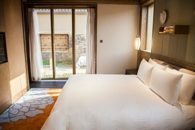 Qu Fu Ni Shan Akadmeid Hotel - Photo3