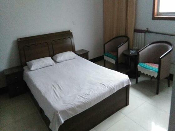 Qufu Fuxing Home Stay - Photo3