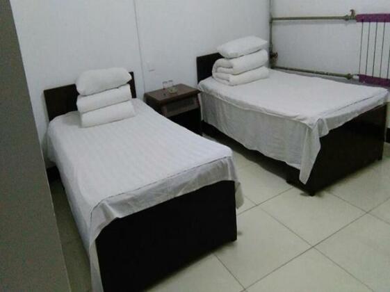 Qufu Fuxing Home Stay - Photo5